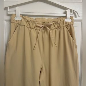 Lululemon, size 8 stretch high rise pant, lemon sorbet color